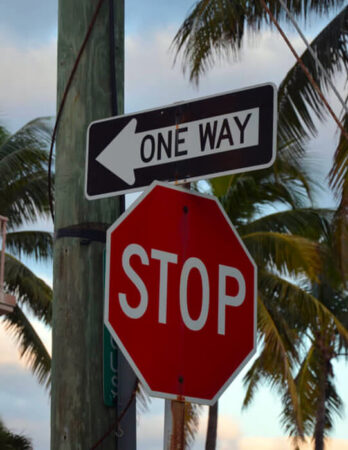 One way and stop signs